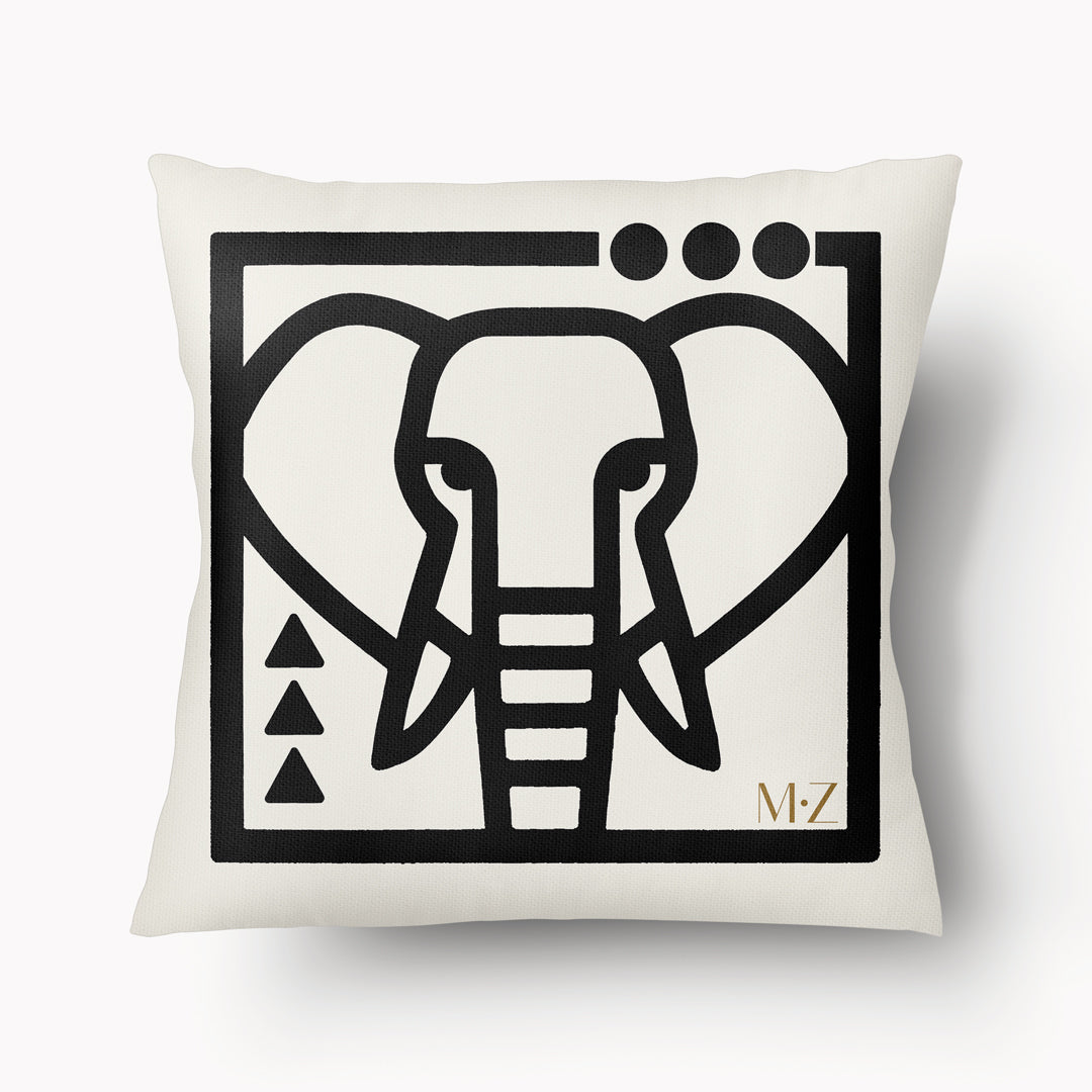 Housse de coussin graphique Mzelle Design - tête d'éléphant bicolore noir et écru, brut et élégant, entre art tribal et design contemporain
