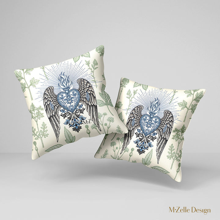 Housse de Coussin EX VOTO Mzelle design - motif coeur bleu avec des ailes et une flamme,  Herbier Vert sur fond écru 