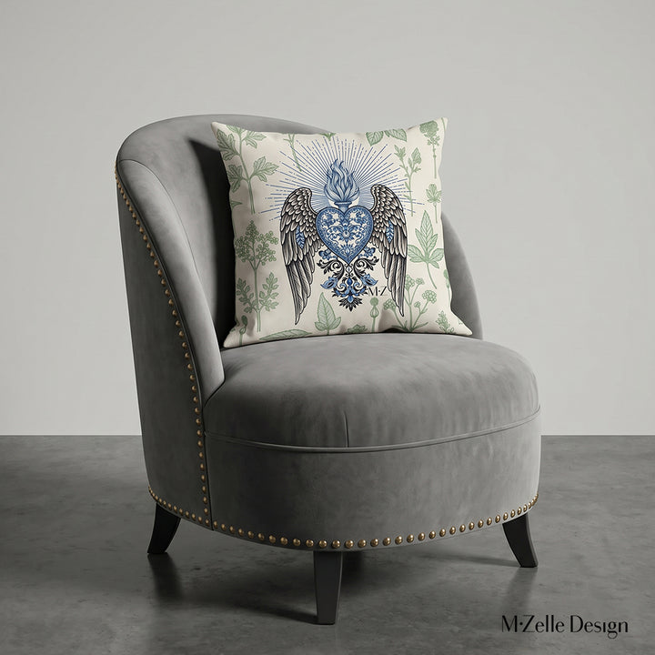 photographie professionnelle, vue de face sur un fauteuil moderne en velours mat, structure en bois de noyer, rivets en laiton, orné d'un large coussin mzelle design motif ex voto art sacré, placé dans un décor beige sobre.