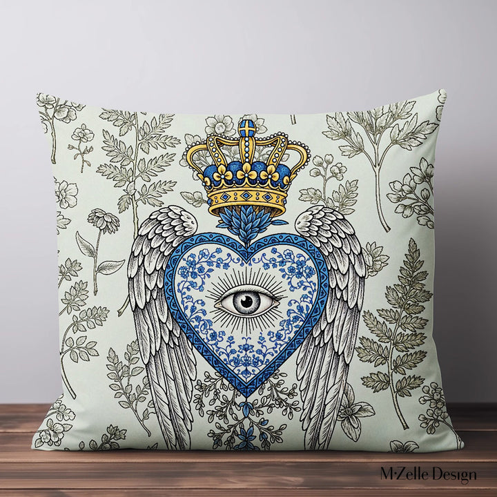 Housse de Coussin EX VOTO Mzelle design -  motif liturgique coeur avec un oeil et des ailes sur fond d'herbier vert