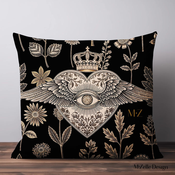 Housse de Coussin EX VOTO Mzelle design -  motif liturgique coeur avec un oeil et des ailes sur fond d'herbier noir et or 