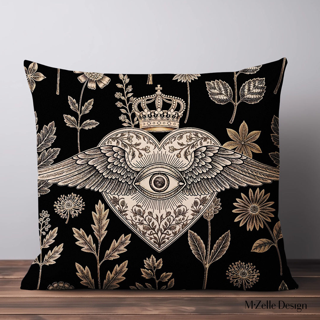 Housse de Coussin EX VOTO Mzelle design -  motif liturgique coeur avec un oeil et des ailes sur fond d'herbier noir et or 