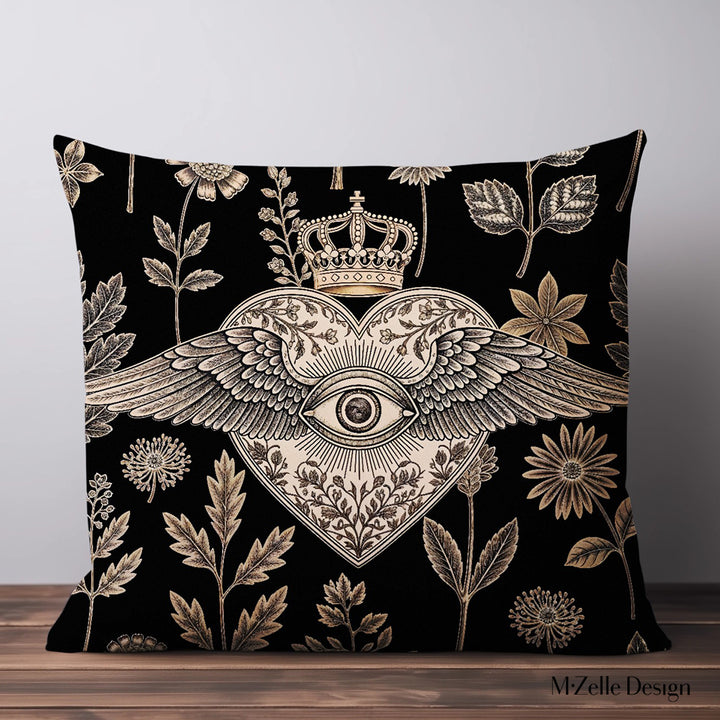 Housse de Coussin EX VOTO Mzelle design -  motif liturgique coeur avec un oeil et des ailes sur fond d'herbier noir et or 