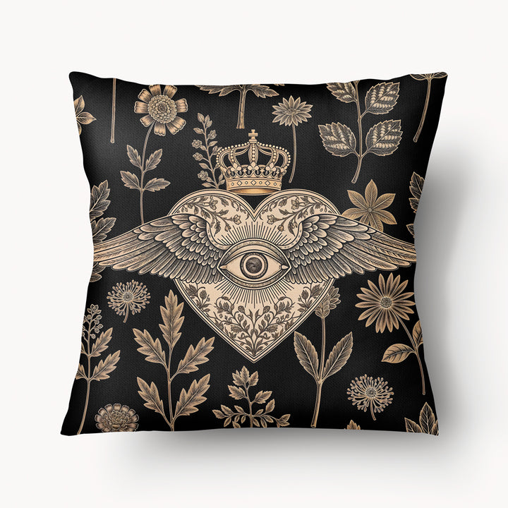 Housse de Coussin EX VOTO Mzelle design -  motif liturgique coeur avec un oeil et des ailes sur fond d'herbier noir et or 