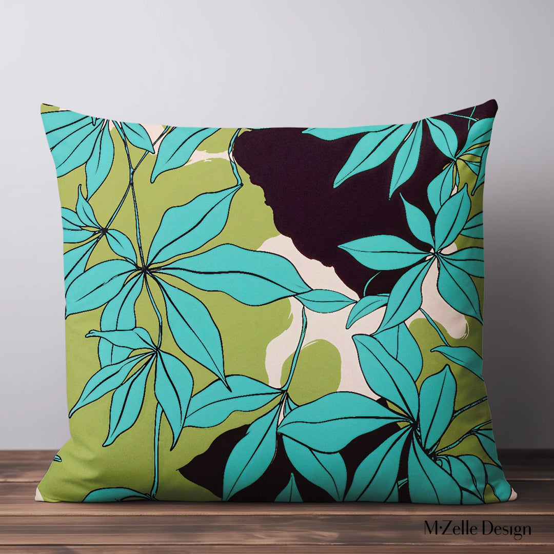 coussin décoratif satinée MZelle Design format carré  imprimée eucalyptus fantaisie moderne coloris vifs turquoise et vert.