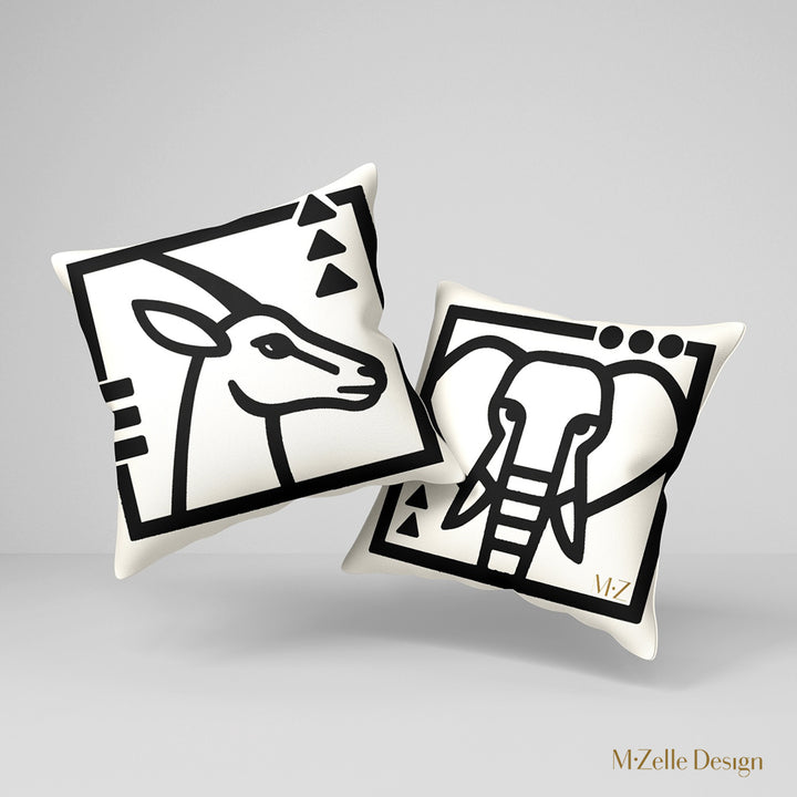 coussins graphique Mzelle Design - tête de gazelle oryx et éléphant bicolore noir et écru, brut et élégant, entre art tribal et design contemporain