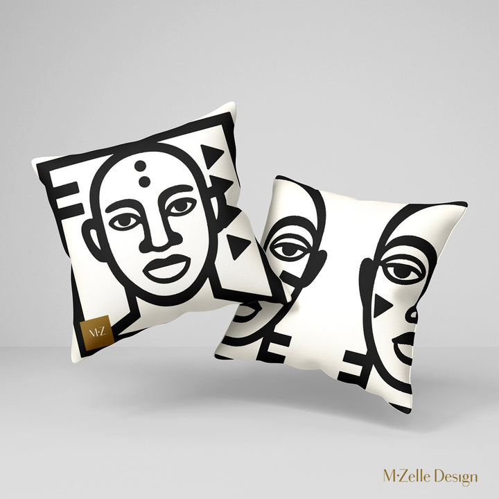 coussin graphique Mzelle Design - tête d'africain avec des symboles géométriques bicolores noir et écru, brut et élégant, entre art tribal et design contemporain