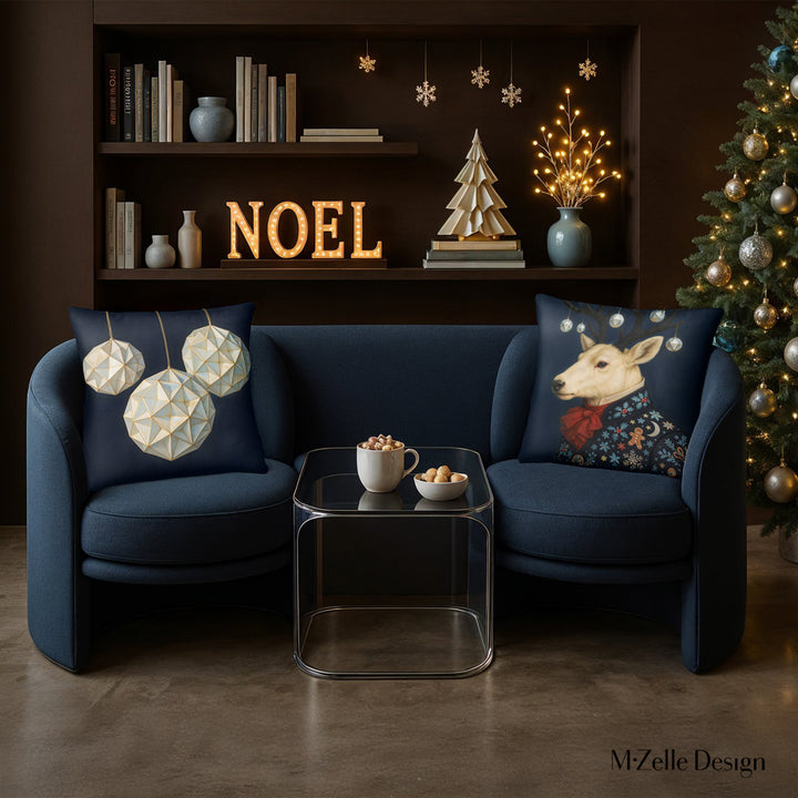 décoration d'intérieur thème noël avec un fauteuil bleu et deux coussins avec un renne et des boules en origami de la marque MZELLE DESIGN
