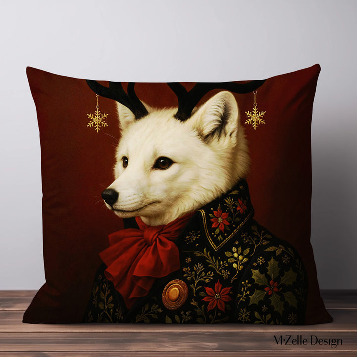 coussin de Noël Mzelle design,  renard polaire aux bois ornés de flocons dorés , raffinement hivernal et touche féerique sur fond rouge foncé