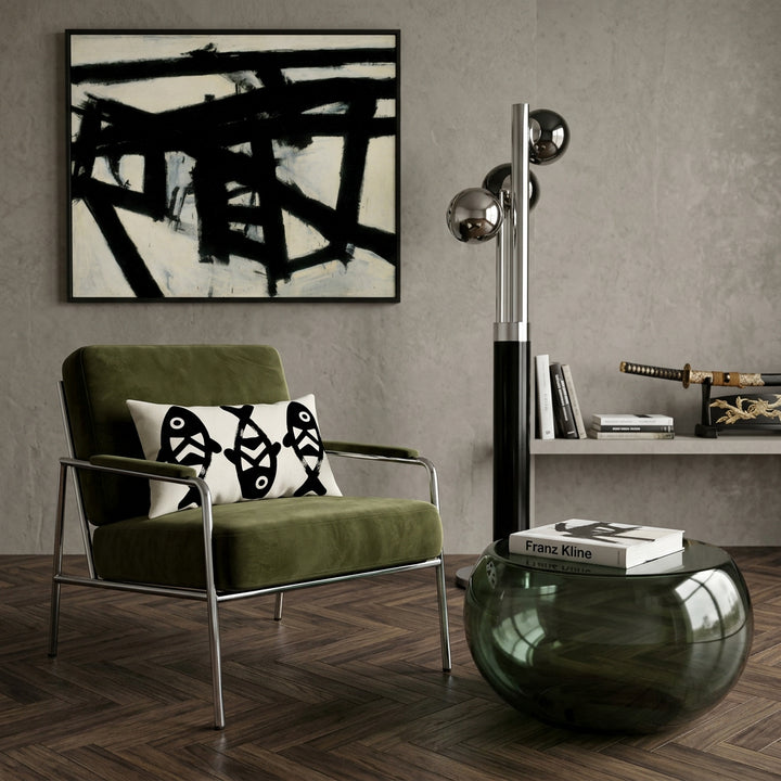 Photographie professionnelle de décoration: salon mid century modern brutaliste très artistique, chaise moderne en velours olive profond structure chrome, orné d'un  coussin  rectangle mzelle design , table basse sphérique en plexiglas fumé vert bouteille translucide,   garnie d'un livre d'art "Franz Kline".