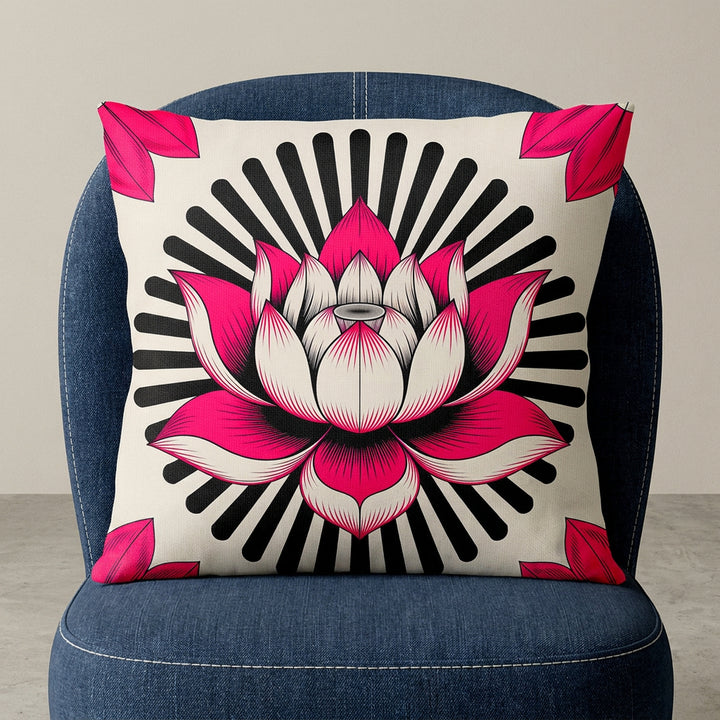 Photographie professionnelle d'un grand coussin mzelle design fleur de lotus stylisé disposé sur un fauteuil crapaud moderne en denim bleu foncé surpiqué de fil blanc, vue de face, sans accoudoirs, dossier arrondi, disposé dans décor écru neutre.