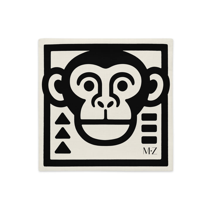 Housse de coussin graphique Mzelle Design - tête de singe stylisé bicolore noir et écru, brut et élégant, entre art tribal et design contemporain