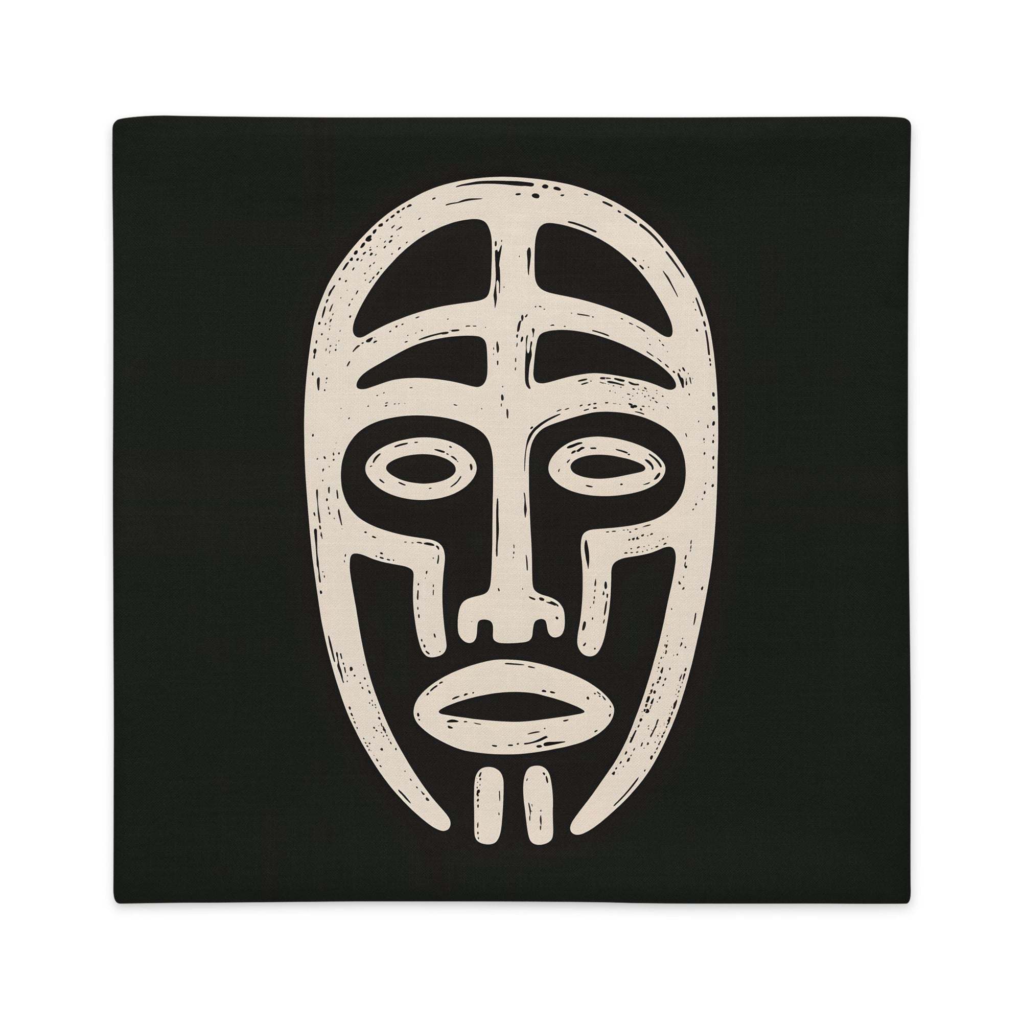 Housse graphique de décoration de la marque MZelle Design, sur fond noir un motif beige représente un masque tribal, style rupestre moderne