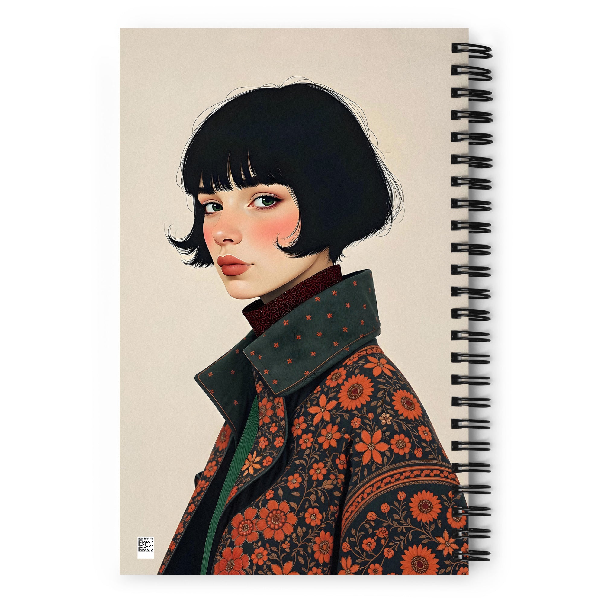 Carnet A5 Mzelle Design, couverture illustrée recto et verso, portrait de femme brune avec un manteau kaki à fleurs oranges sur fond écru.