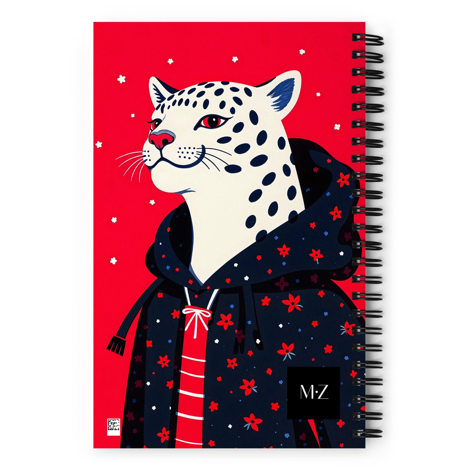 Carnet à spirale A5 MZelle Design couverture illustrée moderne, un jaguar graphique avec un manteau à capuche, recto et verso sur un fond uni rouge. 